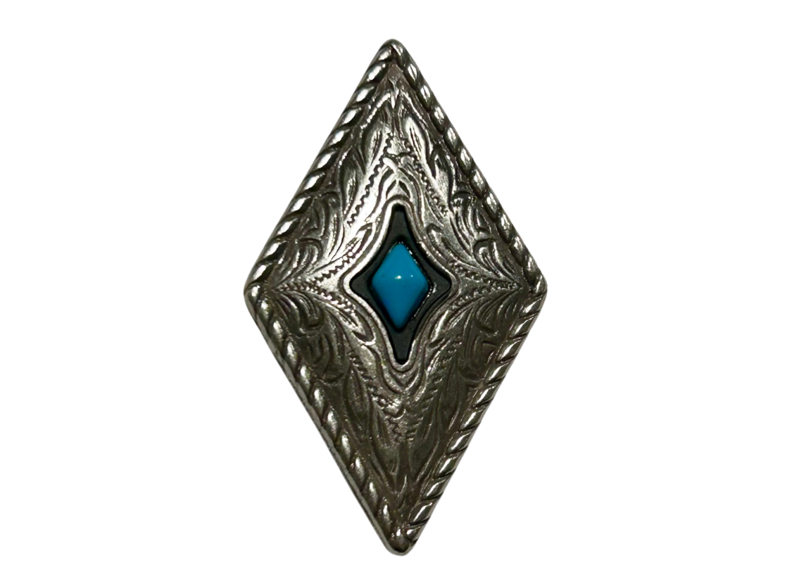 Diamond-shaped metallic concho with a blue gemstone on a white background